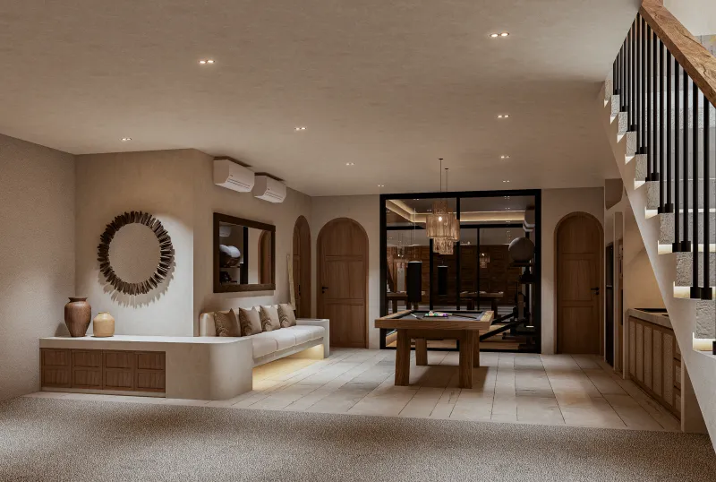 Architectural render of built-in seating and a billiard table beside the stair, with gym equipment beyond.